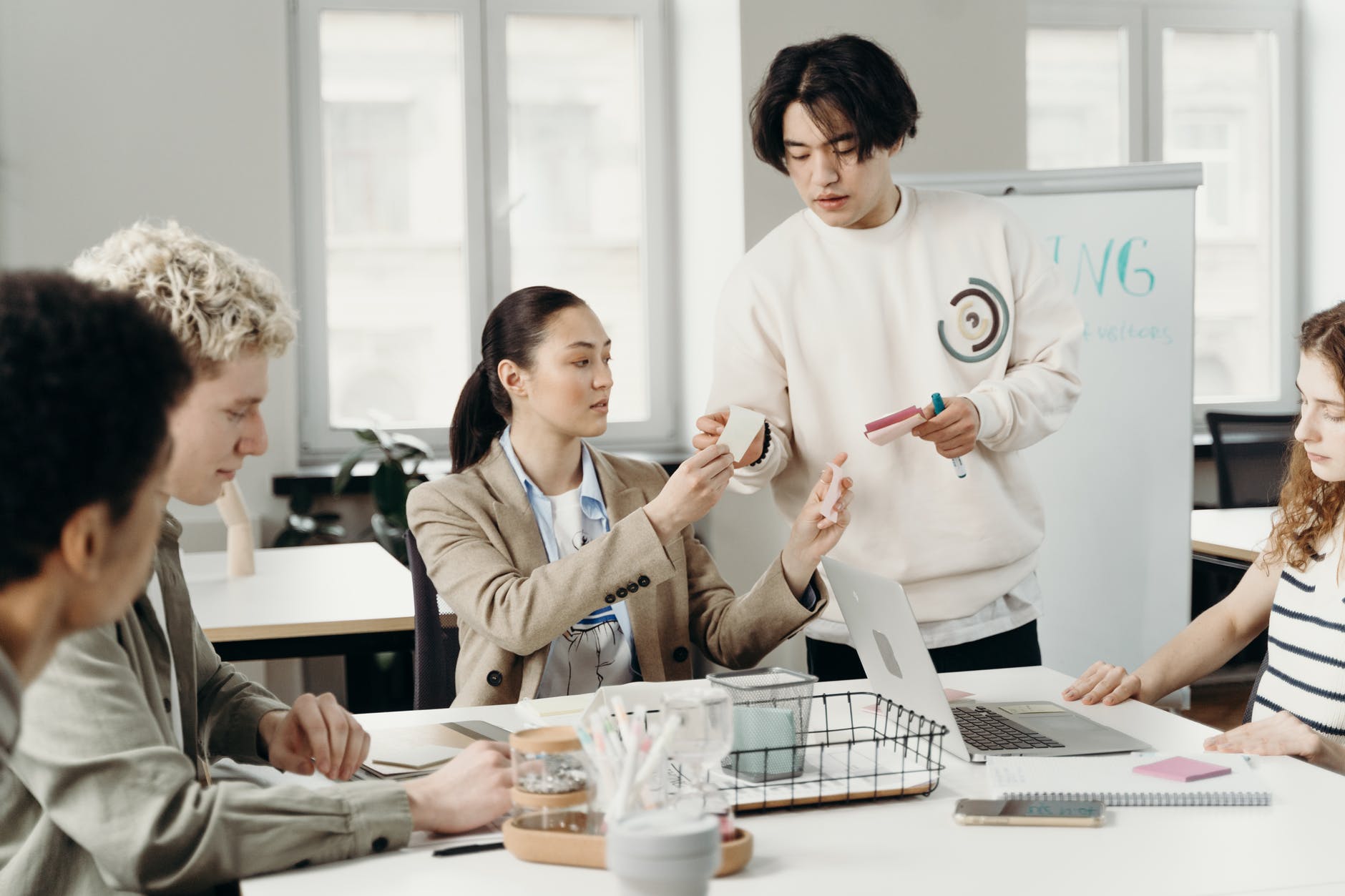 people in a meeting sharing ideas